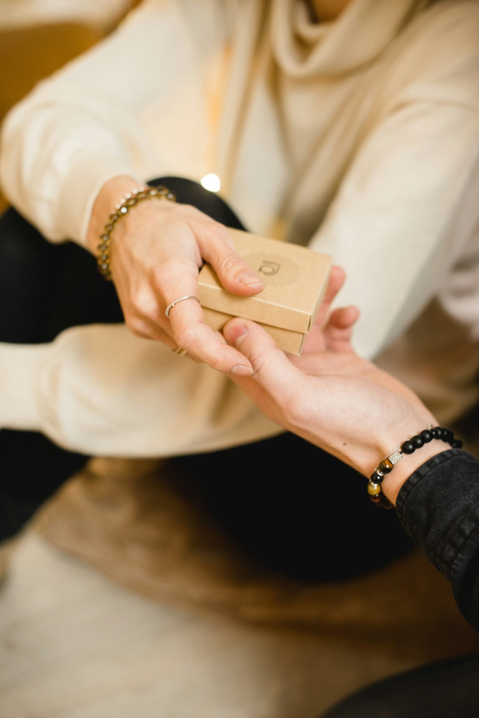 person holding gold iphone 6